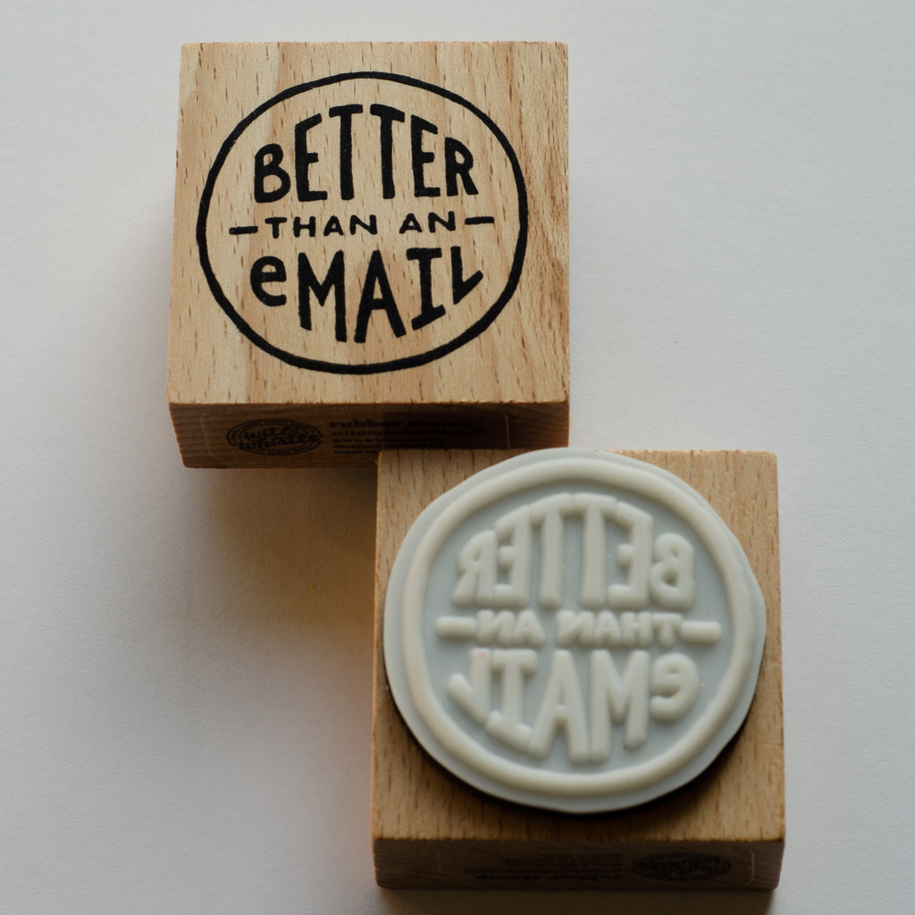 Front and back of square rubber wood stamp