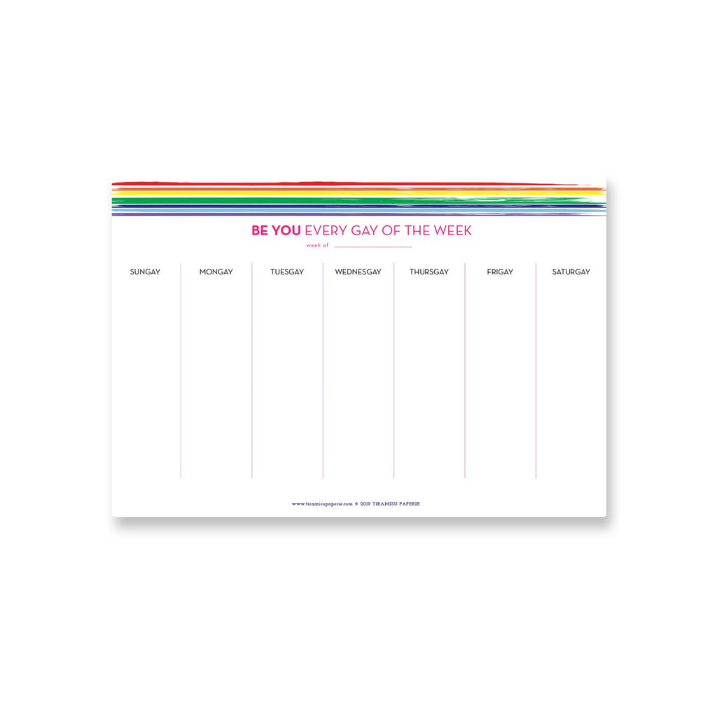 White note pad calendar with rainbow border at top