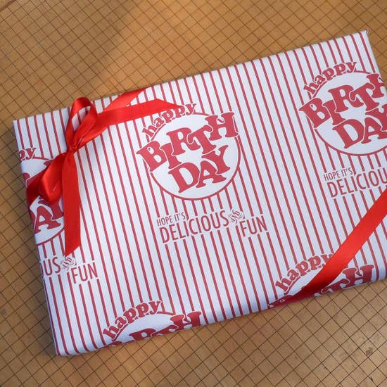 birthday gift wrapped in paper that looks like vintage popcorn box